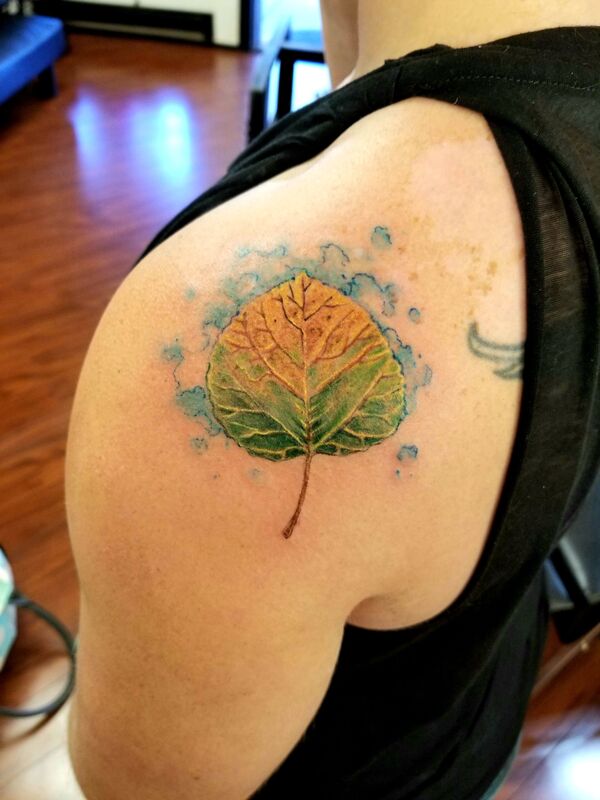 Tattoo done by Ian at Blaque Owl Tattoo in Missoula, MT. The pinecone is  for Montana and the Aspen leaves are for Utah! Two places that will have my  heart forever. :
